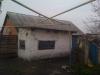 Продам дом не дорого в центре пгт. Решетиловка 15 соток